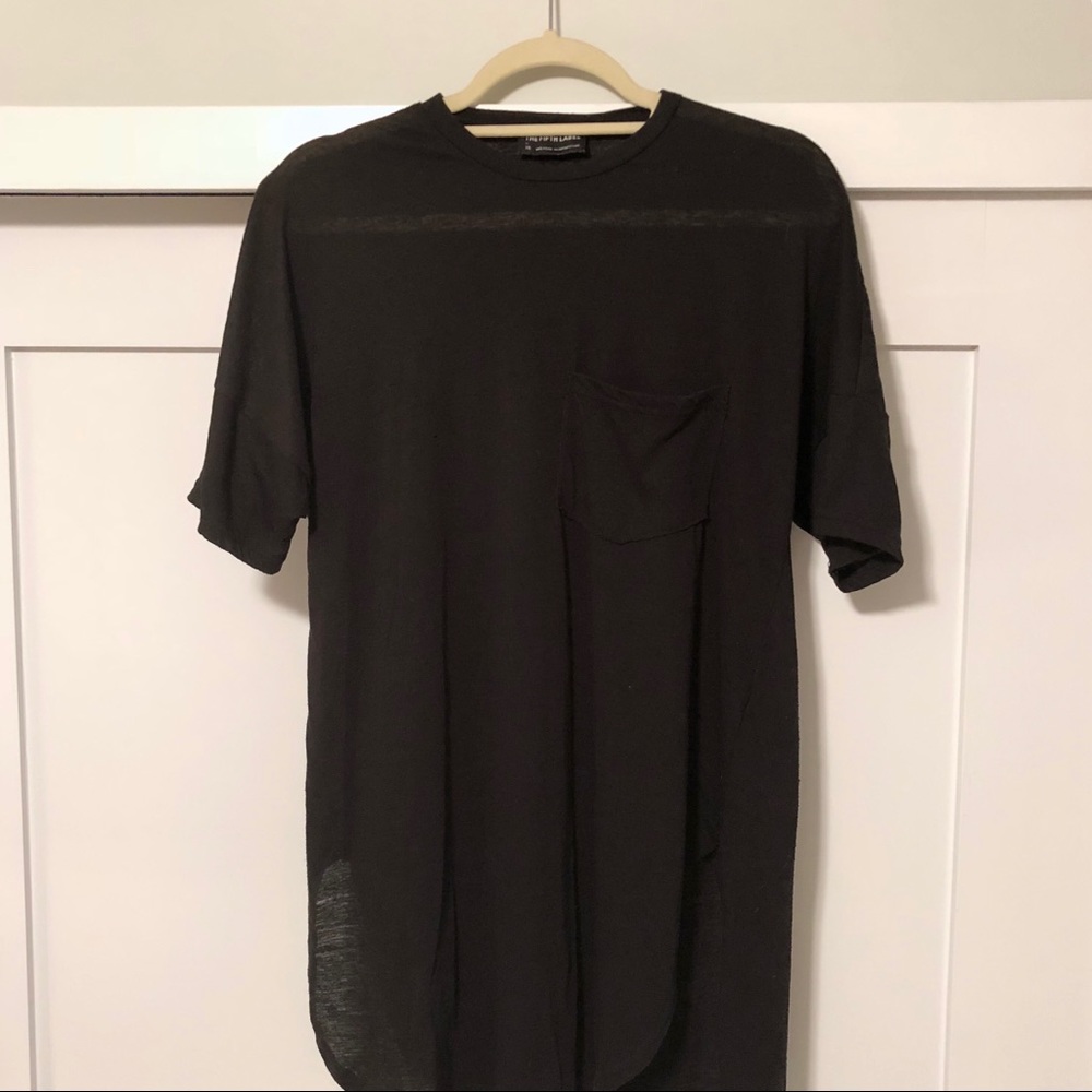 Partially sheer long t-shirt with side slits